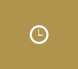 white clock icon on gold square background